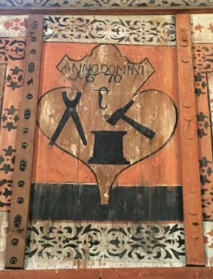Znak cechu kováčov na empore v evanjelickom kostole a. v. v Štítniku, 1670